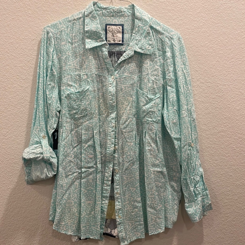 Teal blue colors with some white long sleeve or cuffed sleeve xl